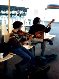 Susan Conger and Michael Kairys fiddling on the ferry